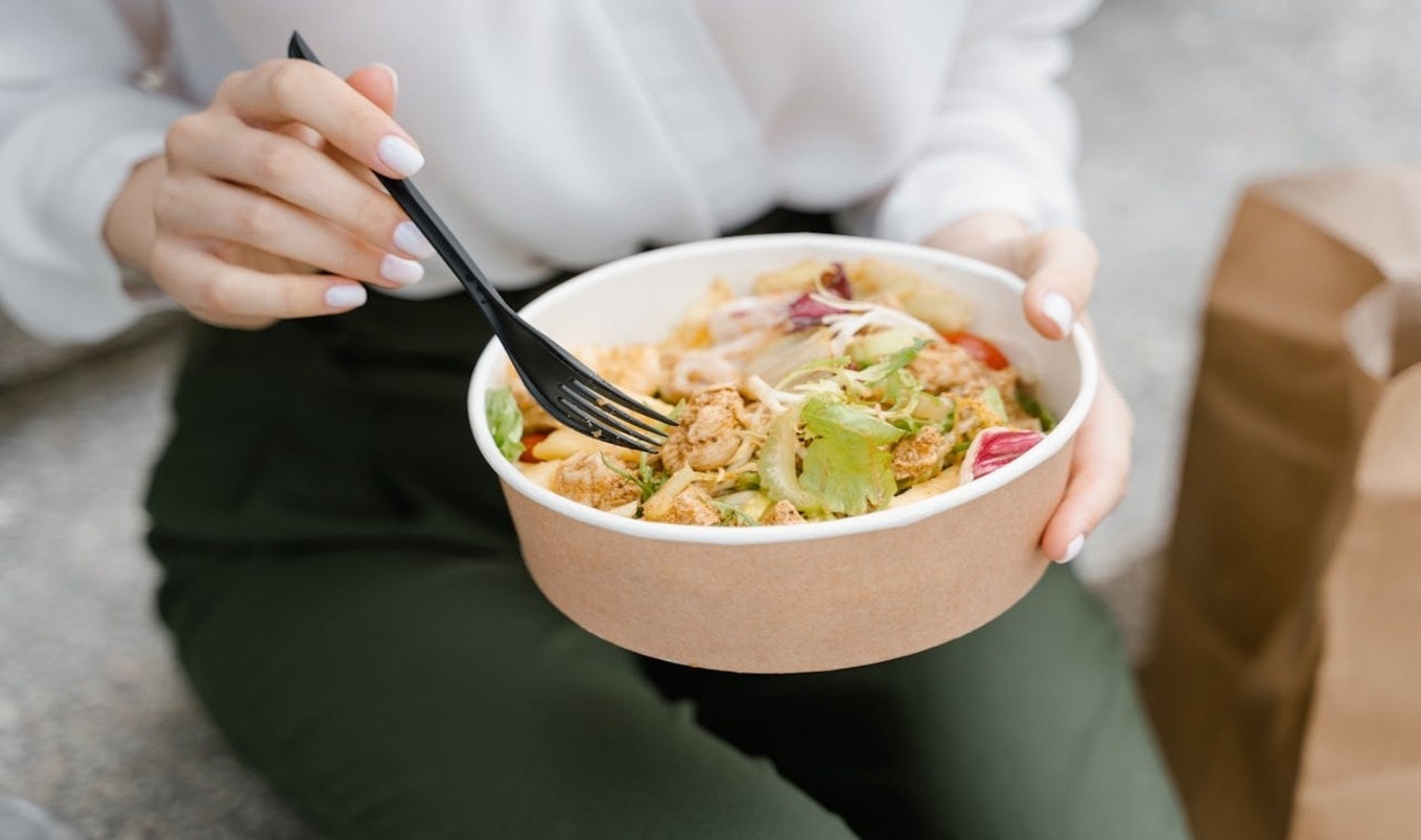 eating bowl of healthy food