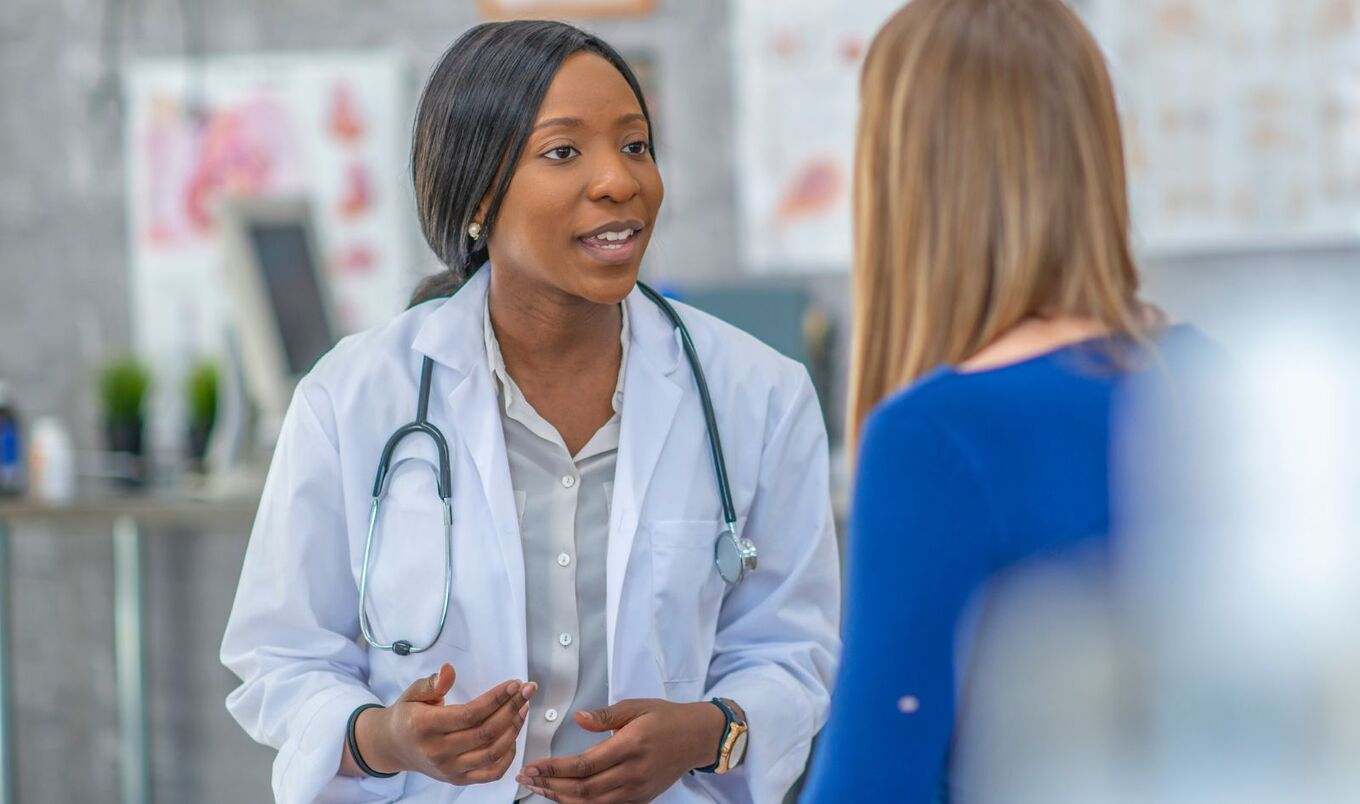 woman with doctor